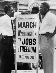 In front of 170 W 130 St., March on Washington, l to r, Bayard Rustin, Deputy Director, and Cleveland Robinson, Chairman of Administrative Committee